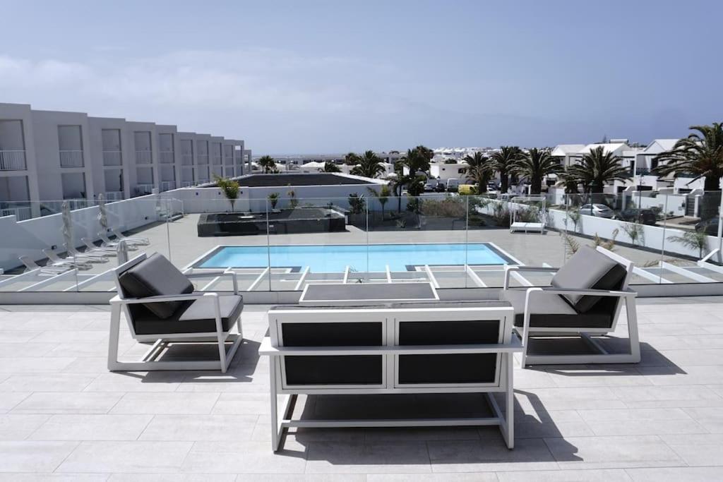 Апартаменты Calma House Коста-Тегисе Экстерьер фото